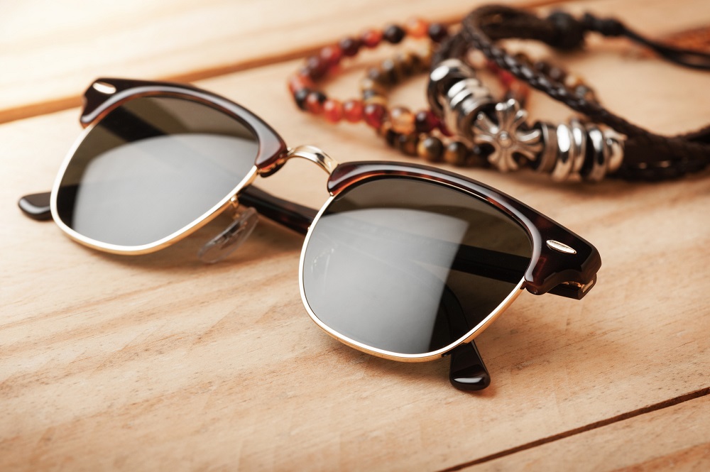 men accessories, closeup brown sunglasses